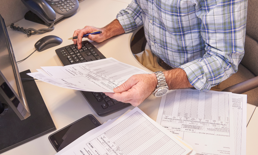 Worker going through papers