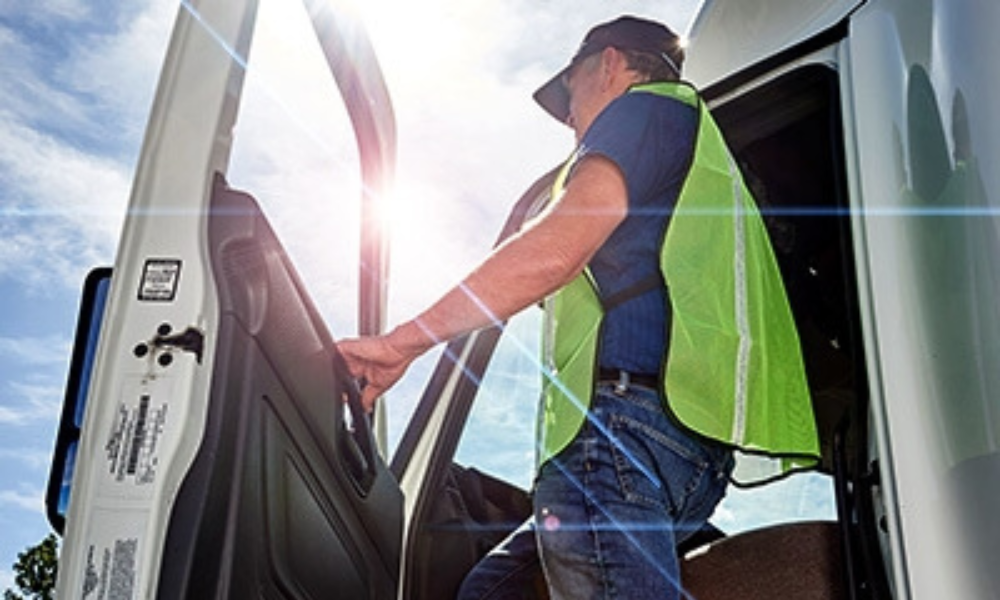 Truck driver outside his cab